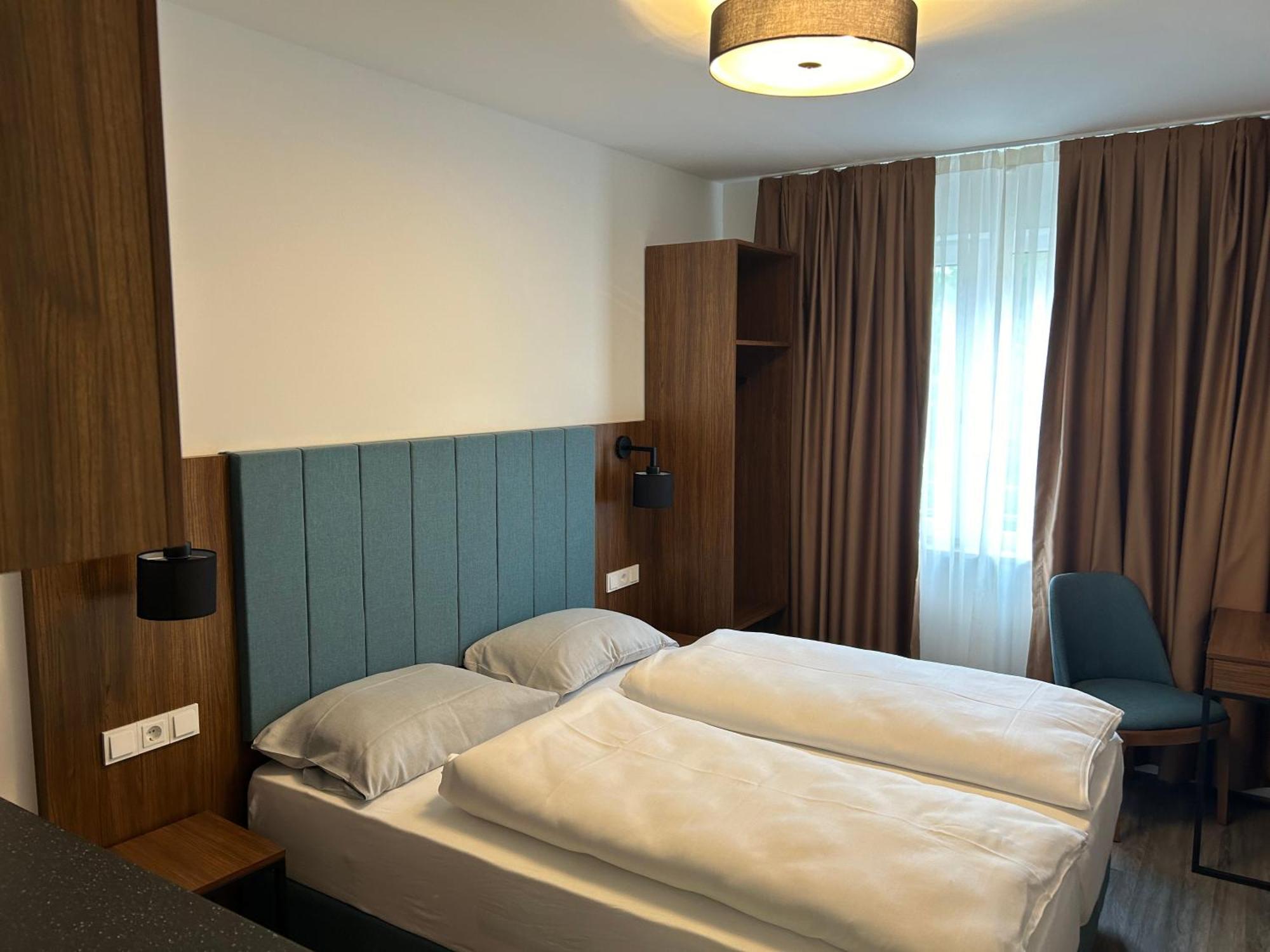 Munique Hotel Muenchen Унтершлайсхайм Экстерьер фото