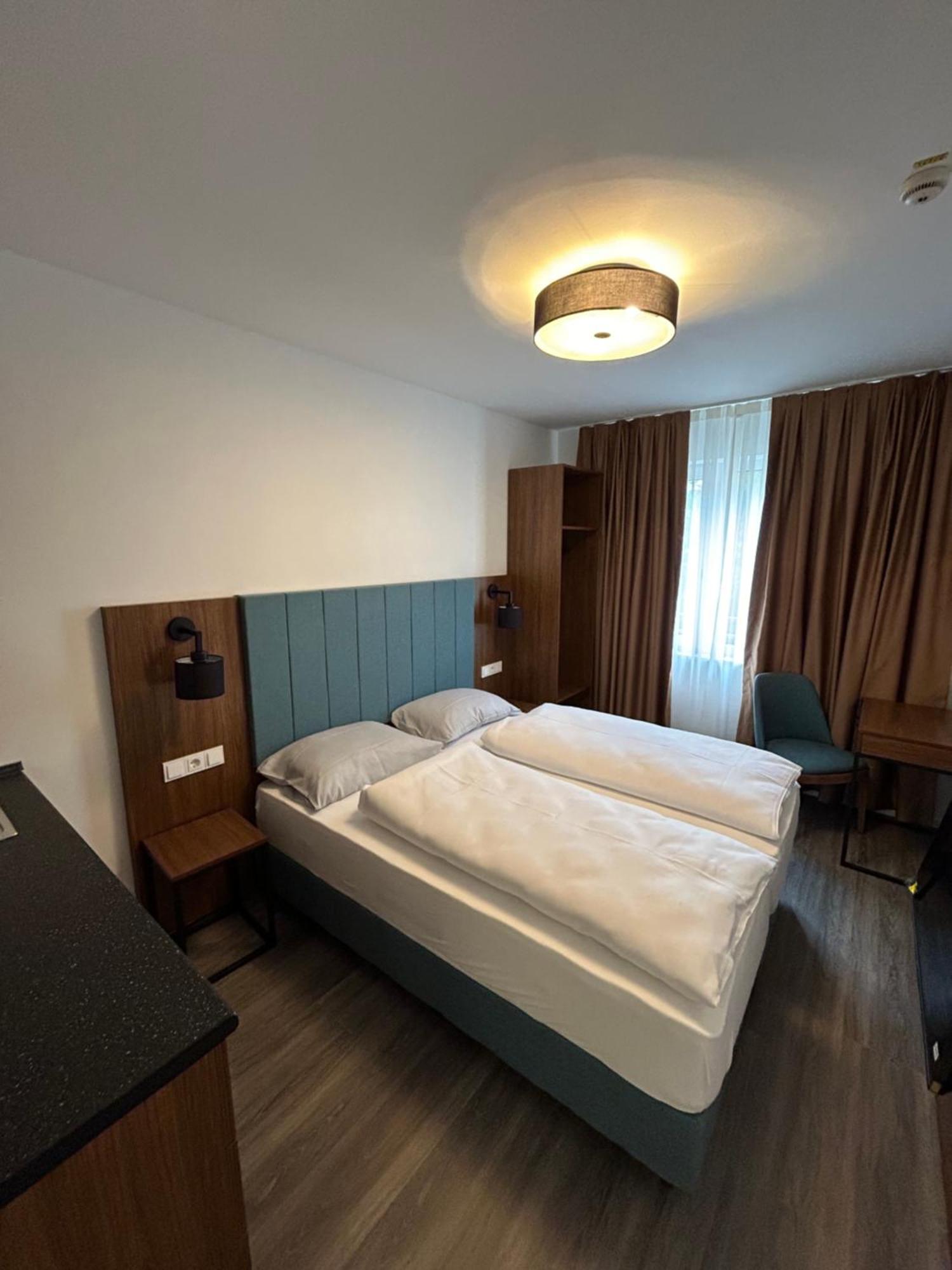 Munique Hotel Muenchen Унтершлайсхайм Экстерьер фото